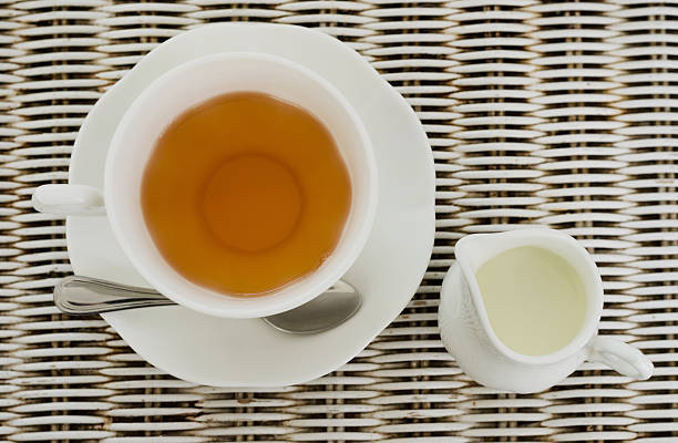 istock Cup of tea with little milk jar 502685075