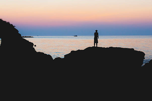 istock Fisherman on the Thailand island cliff. 502687303