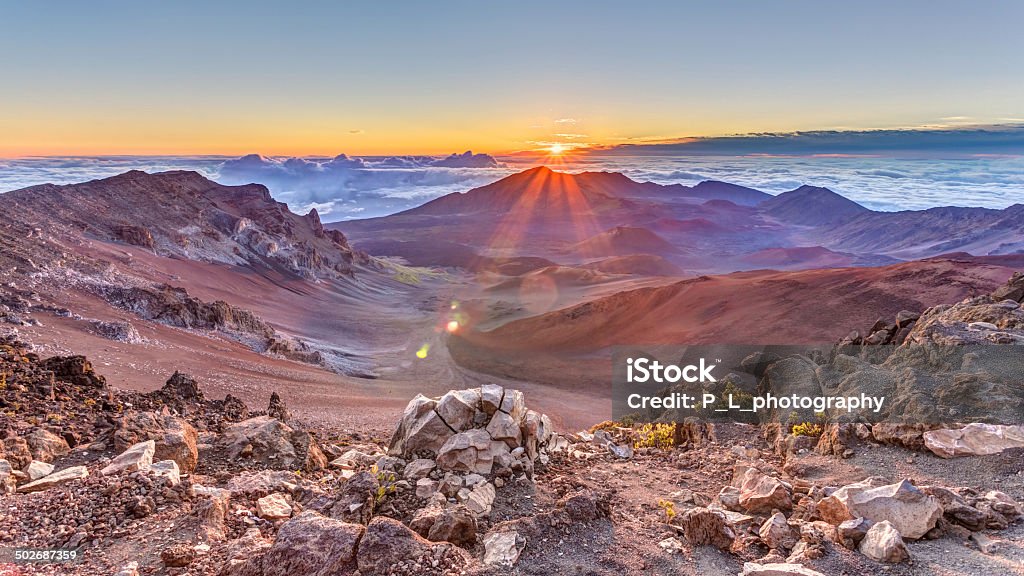 Haleakala Sunrise sunrise from the summit of Haleakala volcano on the tropical  island of Maui, Hawaii Haleakala National Park Stock Photo