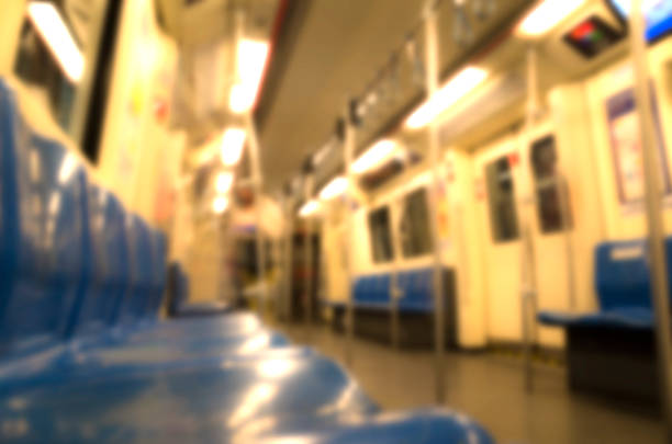 istock Inside train has row of blue seat, blurred. 502696362