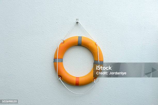 Orange Lifebuoy Stock Photo - Download Image Now - Buoy, Life Belt, 2015