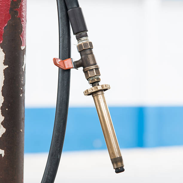 istock Fuel nozzle hang on the pole 502700746