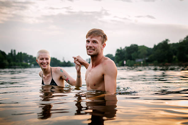 istock Couple enjoying a Summer evening at a Lake 502702643