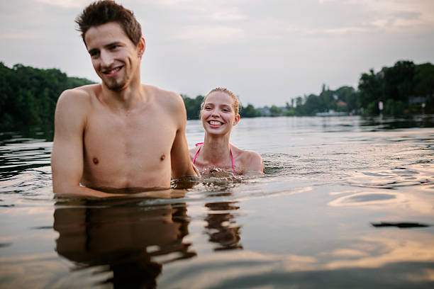 istock Couple enjoying a Summer evening at a Lake 502702673