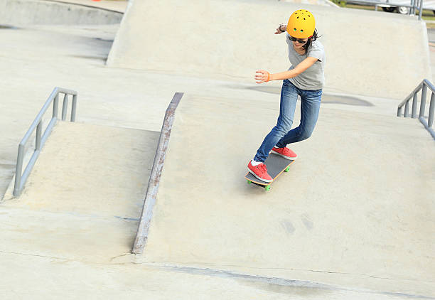 istock skateboarding woman at skatepark 502704018