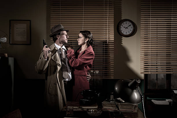 istock Passionate vintage couple with gun 502704938