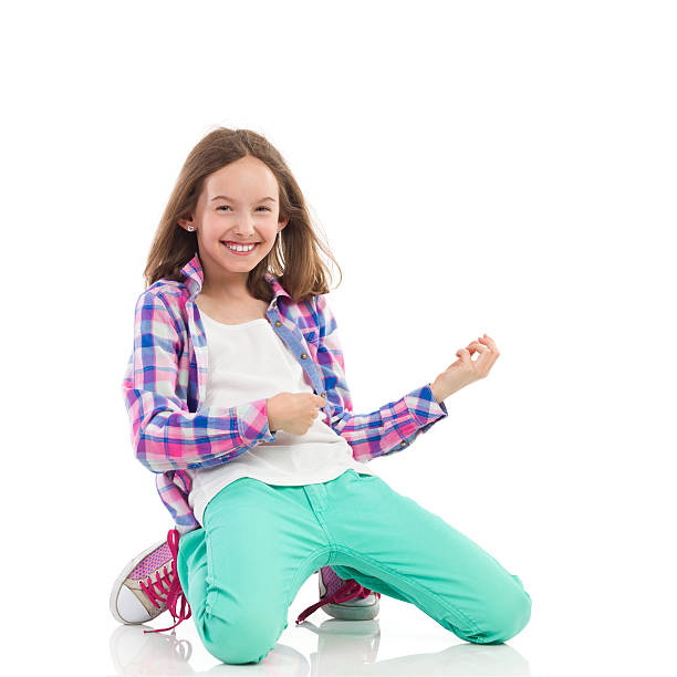 istock Smiling girl playing the air guitar 502705937