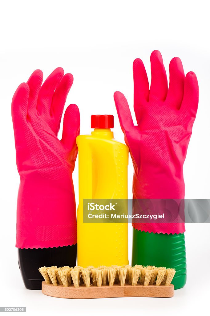 colorful cleaning equipment on table colorful cleaning equipment on table isolated on white 2015 Stock Photo