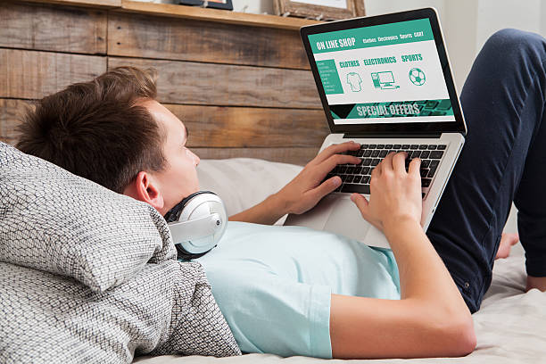 istock Man shopping by internet with laptop. 502706632