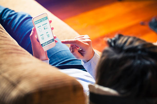 istock On line shopping. Woman using a mobile screen for buying. 502707120