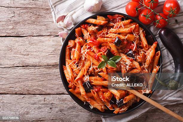 Italian Pasta Alla Norma Closeup And Ingredients Horizontal To Stock Photo - Download Image Now