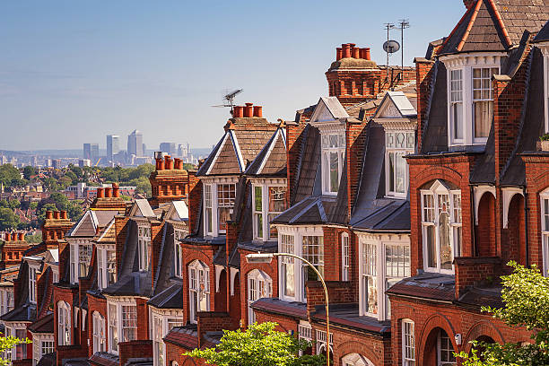 Typical British brick houses on a sunny afternoon panoramic shot stock photo