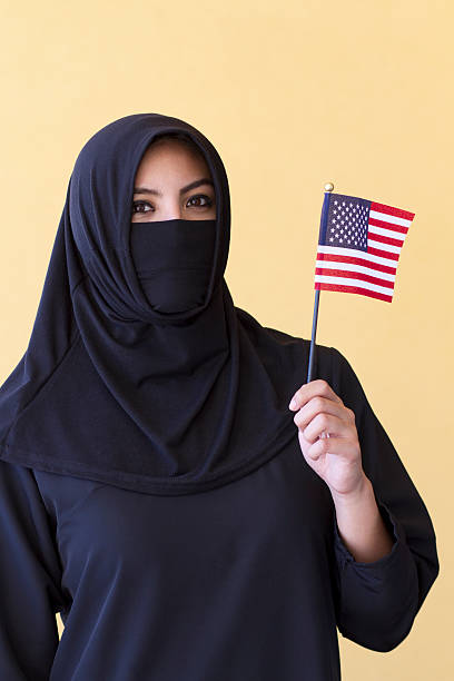 istock Middle Eastern Woman With American Flag 502722113