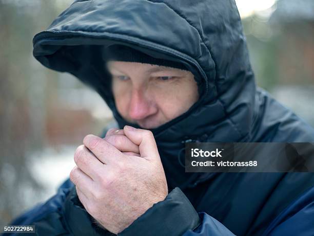 Man Warming Hands Stock Photo - Download Image Now - Cold Temperature, Frozen, Men