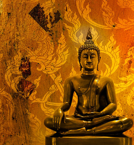 istock Buddha statue on grunge background. 502723133
