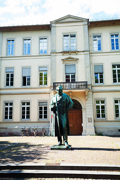 Robert Wilhelm Bunsen monument in Heidelberg Heidelberg, Germany - June 3, 2015: Robert Wilhelm Bunsen monument in Heidelberg in front of psychological institute. Made by H. Volz. heidelberg germany stock pictures, royalty-free photos & images