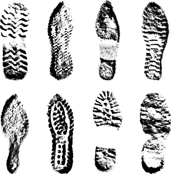 istock Collection  imprint soles shoes  black  silhouette. Vector illustration 502725308