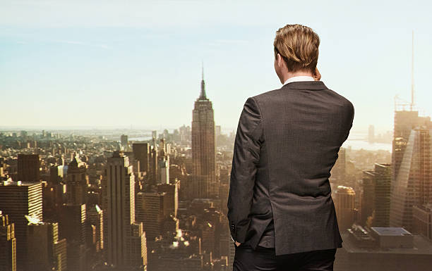 istock Rear view of businessman talking on mobile 502725353
