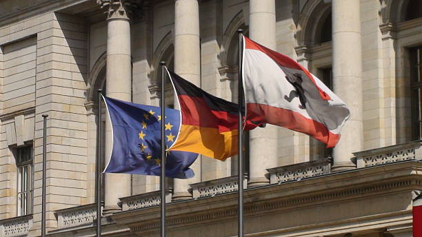 istock EU, German, and Berlin Flags before  Abgeordnetenhaus in Berlin, Germany 502725450