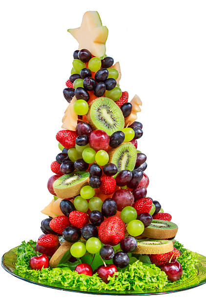 istock christmas tree made from fruit Berry on white back ground 502726972