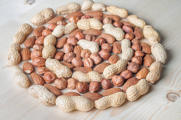 istock Various nuts in the round shaped heap 502727008