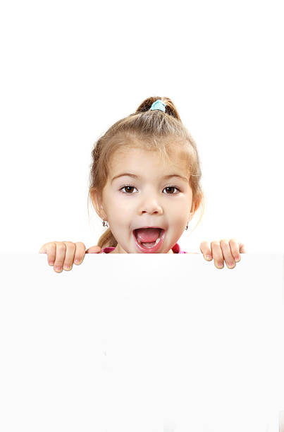 istock cute baby with white blank banner isolated 502728364