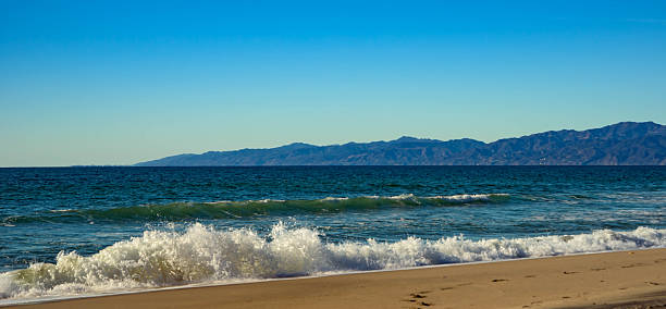 The surf on a beach in Los Angeles, CA.