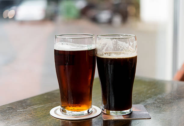 istock glasses of dark beer 502732202
