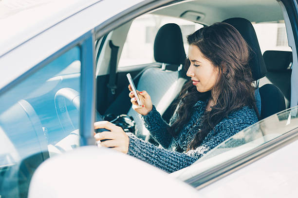 istock Young girl texting on cell phone 502734402