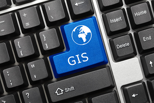 Close-up view on conceptual keyboard - GIS (blue key)