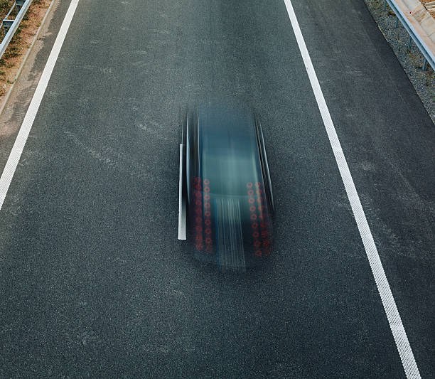 istock Blurred black car on a highway 502734668