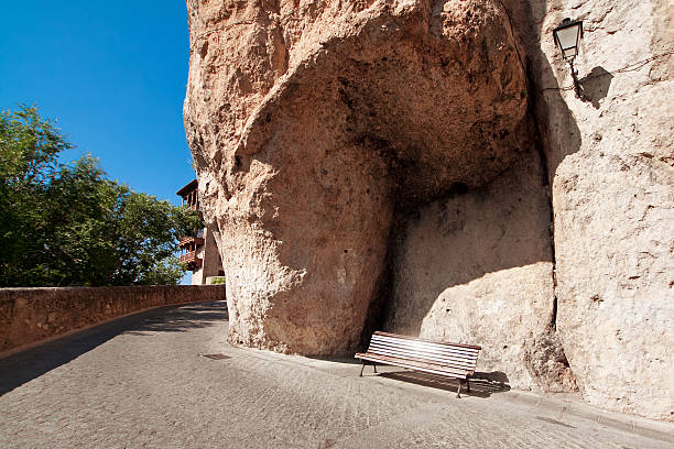 Bench under a rock, houses hung (casas colgadas) in Cuenca, Castilla-La Mancha, Spain