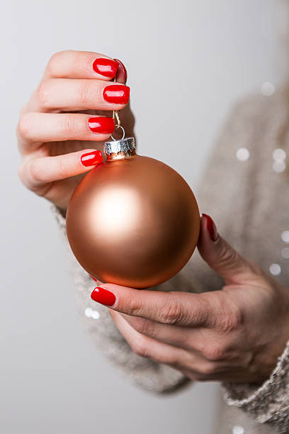 istock Close up hand holding Christmas ball 502737016