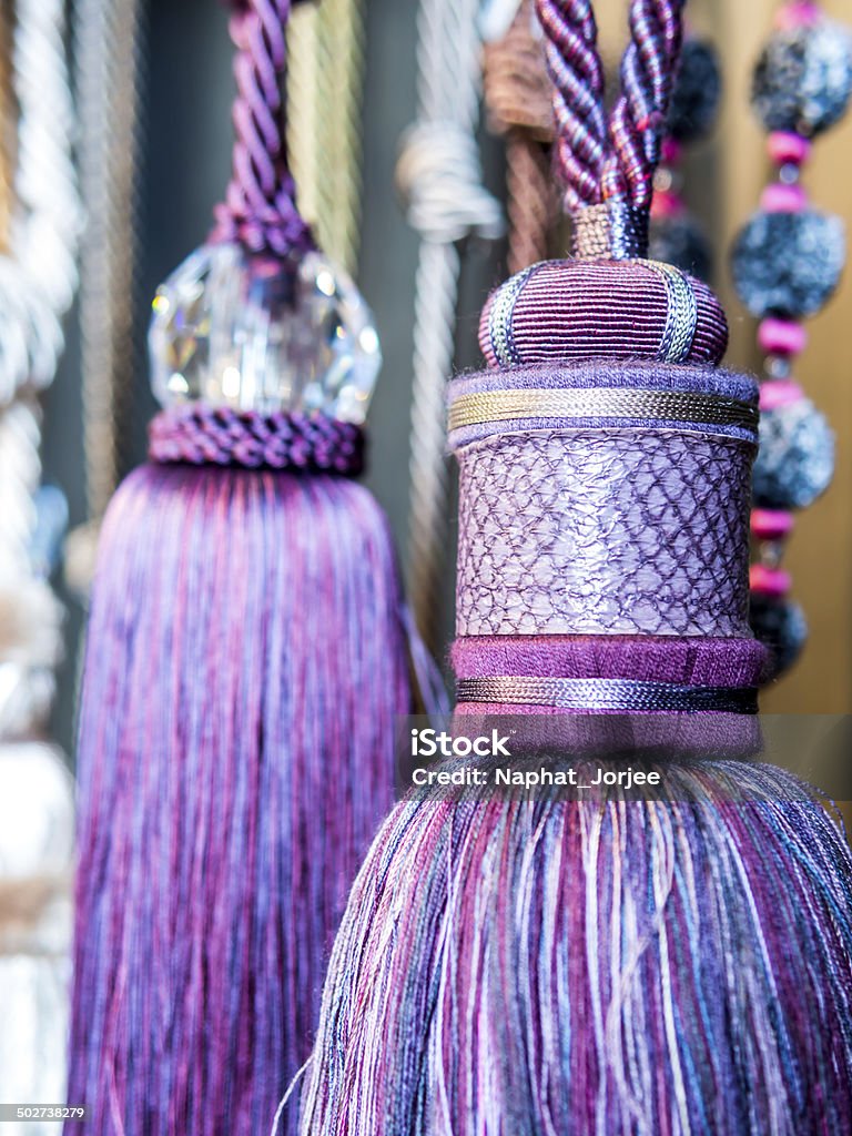 Closeup of decorative weave tassel for curtains design Art And Craft Stock Photo