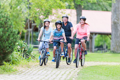 Family biking outdoors