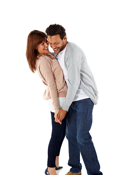 istock Loving mature couple dancing on white 502740791