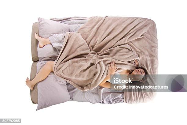 Female Insomniac Suffering From Sleep Deprivation In Bed Stock Photo - Download Image Now