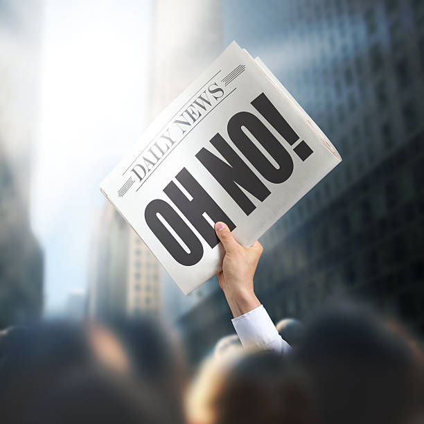 istock Holding Newspaper with Oh No 502743349
