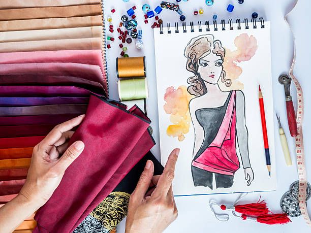 istock Fashion designer working with material sample and hand-drawn  illustration 502745301