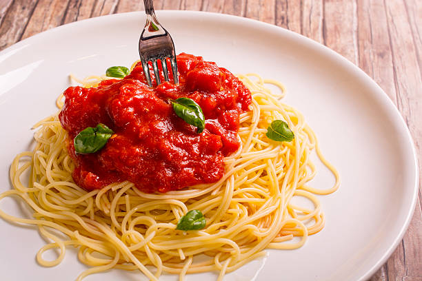istock Italian spaghetti with tomato and basil 502752313