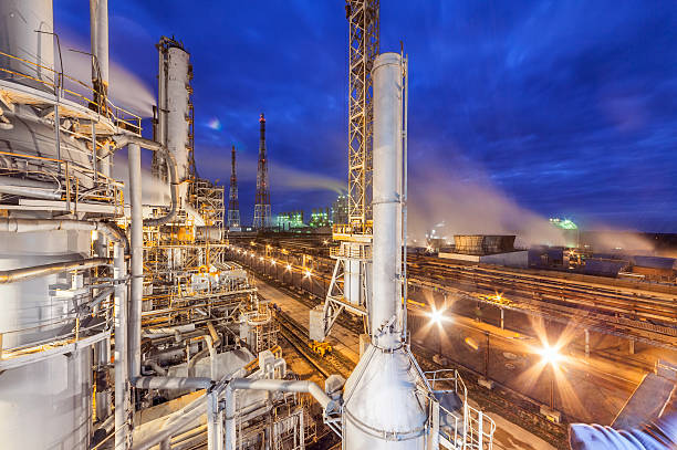 Chemical plant for production of ammonia and nitrogen fertilization Chemical plant for production of ammonia and nitrogen fertilization on night time. nitrogen photos stock pictures, royalty-free photos & images