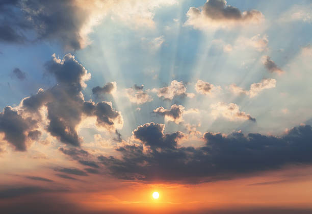 istock Sunset with sun rays. Colorful blur sky with sun background. 502753874
