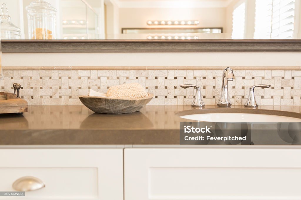 New Modern Bathroom Sink, Faucet, Subway Tiles and Counter Beautiful New Modern Bathroom Sink, Faucet, Subway Tiles and Counter. Bathroom Stock Photo