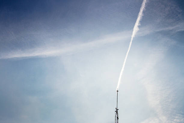 istock Jet trail connected to antenna. 502755636
