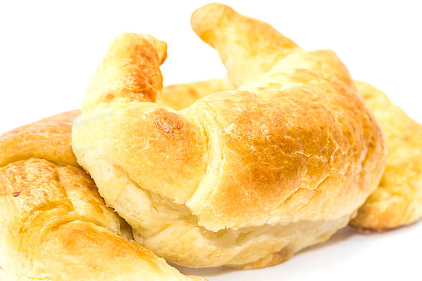 istock Fresh croissant isolated on white 502755911