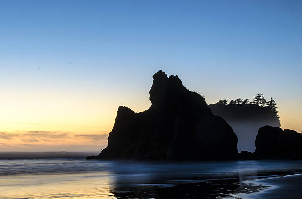 istock Sea Stack Silhouette at sunset in the Pacific Northwest 502756186