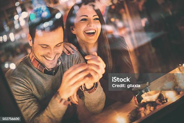 Couple Having Fun At Coffee House Stock Photo - Download Image Now - Date Night - Romance, Couple - Relationship, Bar Counter