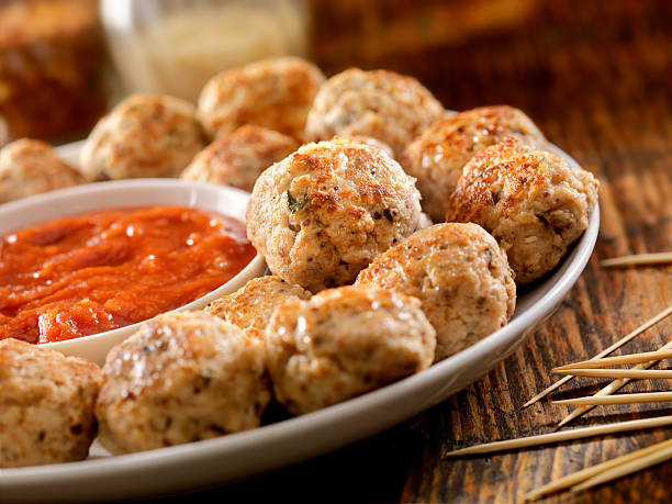 Turkey Meatballs Italian Style Turkey Meatballs with a Marinara Sauce for Dipping-Photographed on Hasselblad H3D2-39mb Camera chicken balls stock pictures, royalty-free photos & images