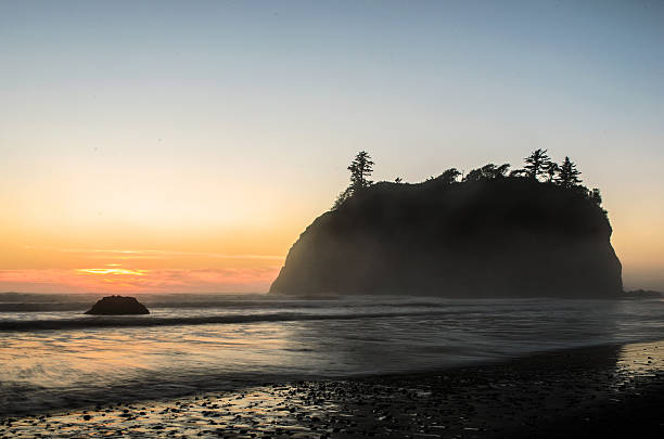 istock Sea Stack Silhouette at sunset in the Pacific Northwest 502757096
