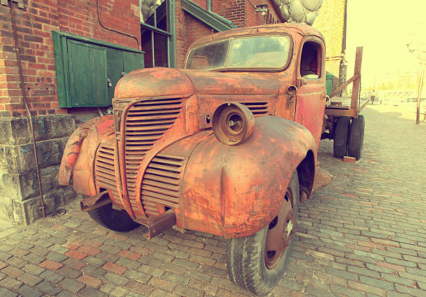 istock rusty old red truck parked on a street 502757345